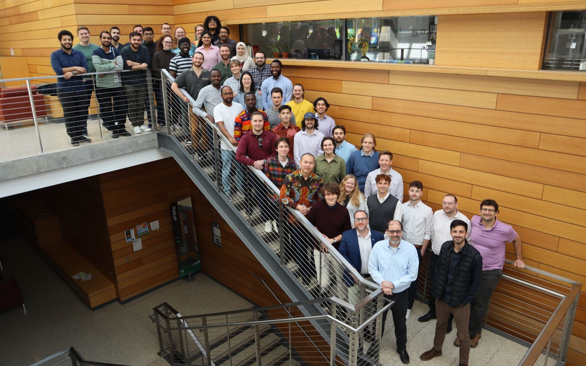 Image of members of the Oregon Center for Electrochemistry standing on a staircase